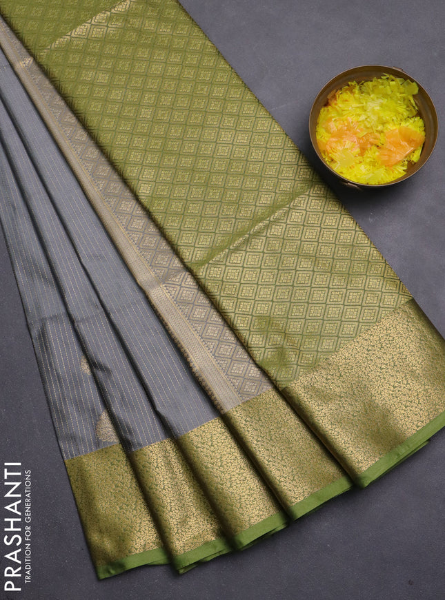 Semi soft silk saree grey and lime green with allover zari weaves & buttas and zari woven border