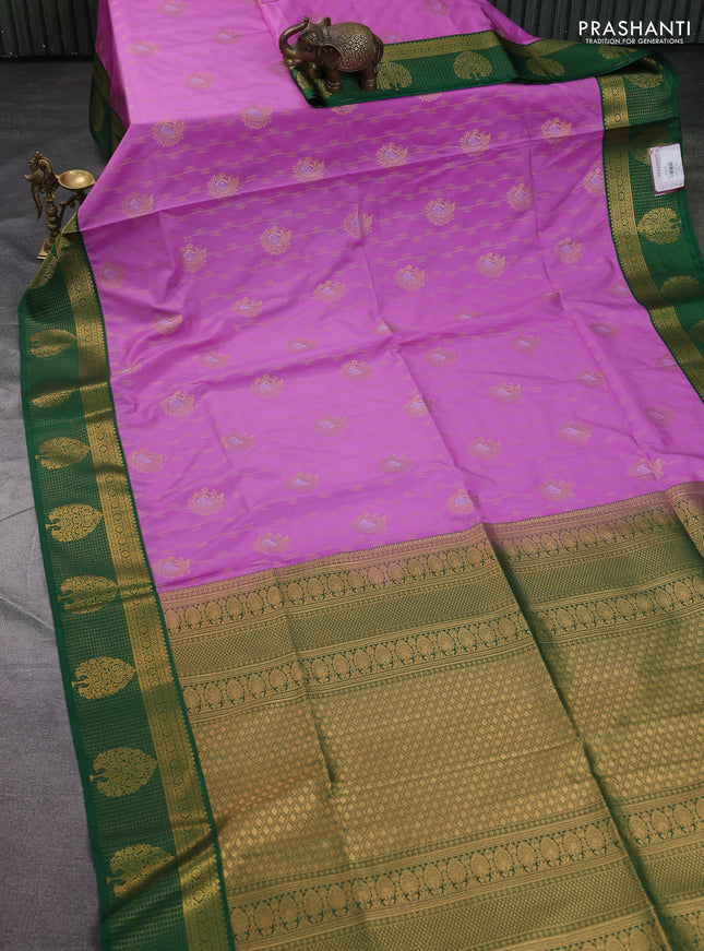 Semi soft silk saree lavender and green with allover zari woven buttas and zari woven korvai border