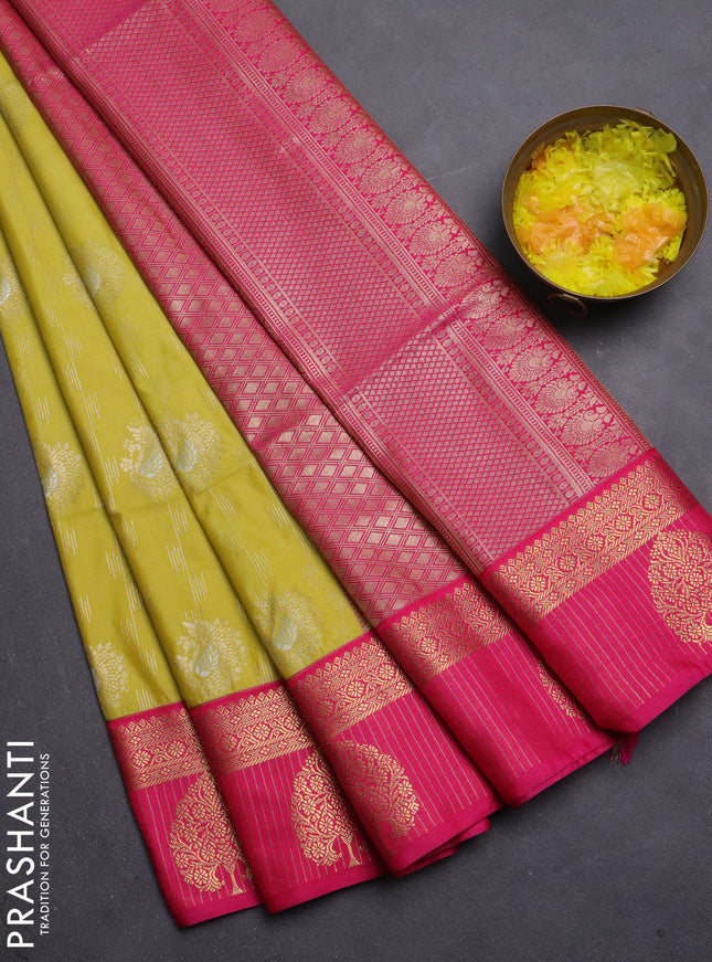 Semi soft silk saree pale yellow and pink with allover zari woven buttas and zari woven korvai border