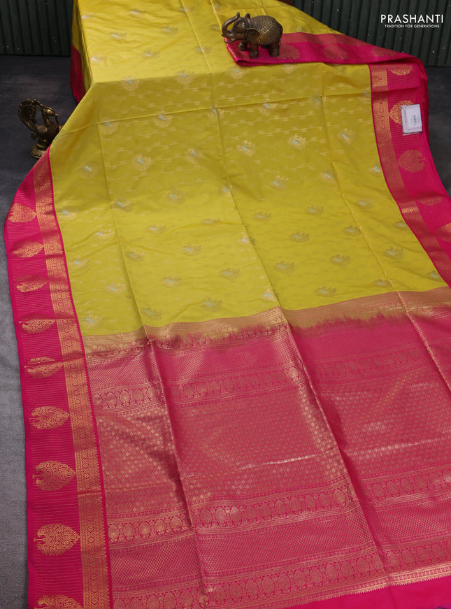 Semi soft silk saree pale yellow and pink with allover zari woven buttas and zari woven korvai border