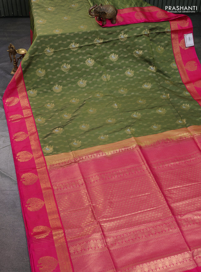 Semi soft silk saree pastel green and pink with allover zari woven buttas and zari woven korvai border