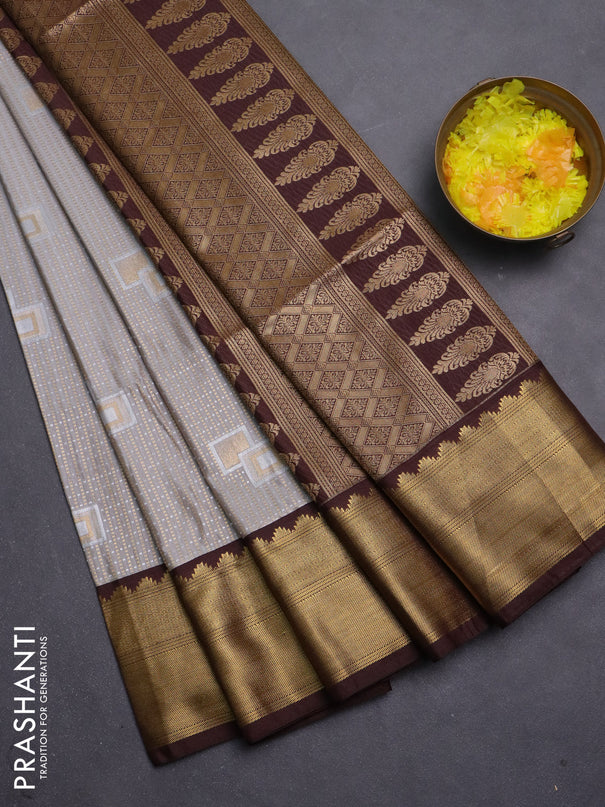 Semi soft silk saree beige and coffee brown with allover zari weaves & buttas and zari woven korvai border
