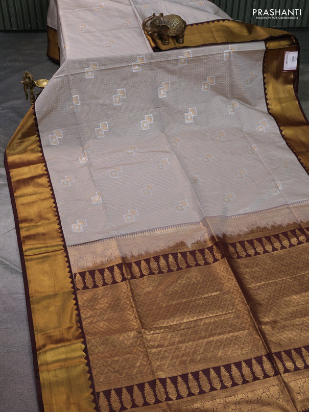 Semi soft silk saree beige and coffee brown with allover zari weaves & buttas and zari woven korvai border