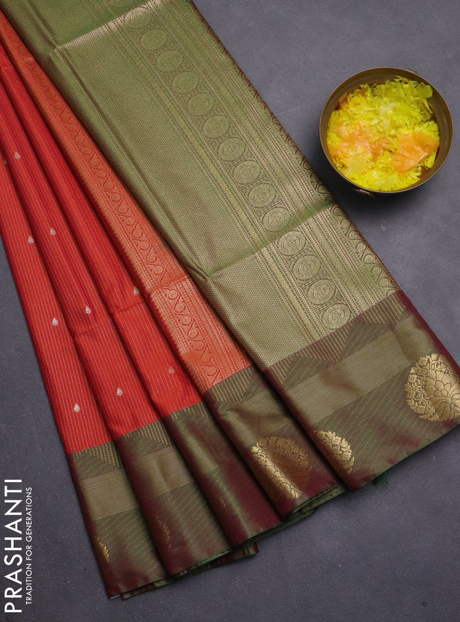 Semi soft silk saree rustic orange and green with allover zari weaves & buttas and zari woven border
