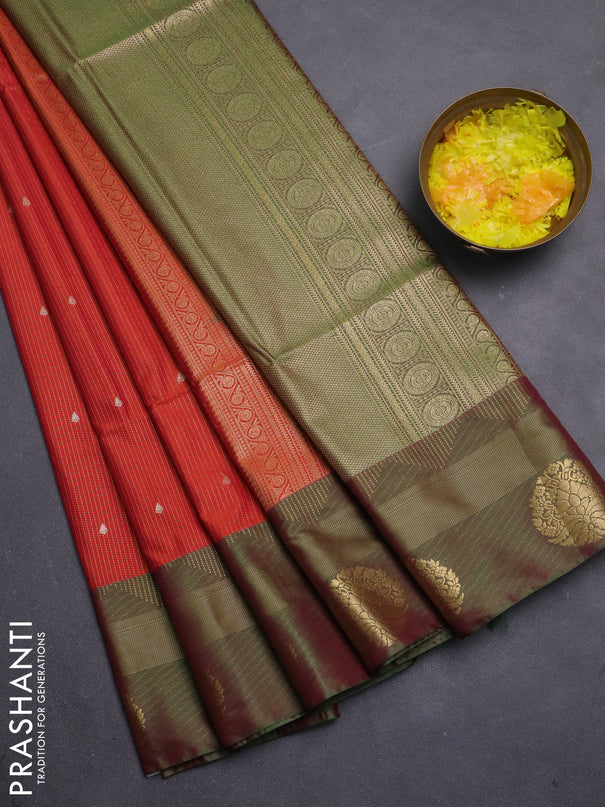 Semi soft silk saree rustic orange and green with allover zari weaves & buttas and zari woven border