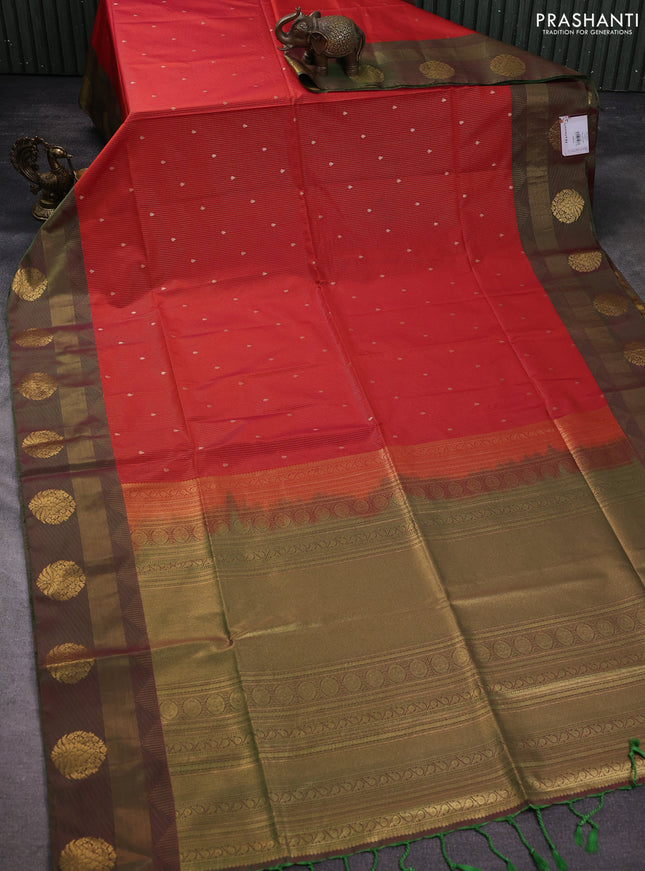 Semi soft silk saree rustic orange and green with allover zari weaves & buttas and zari woven border