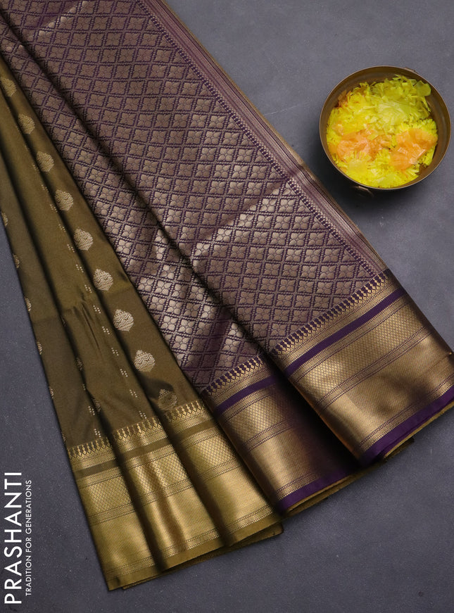 Semi soft silk saree mehendi green and purple with allover zari woven buttas and zari woven korvai border