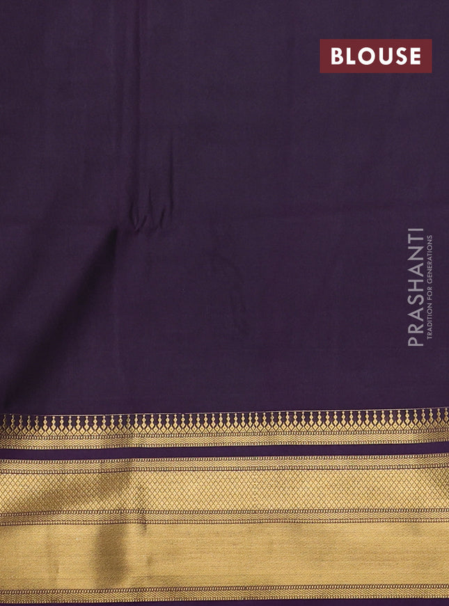 Semi soft silk saree mehendi green and purple with allover zari woven buttas and zari woven korvai border