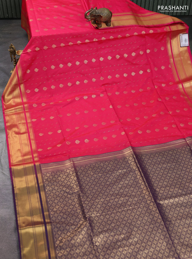 Semi soft silk saree pink and deep purple with allover zari woven buttas and zari woven korvai border