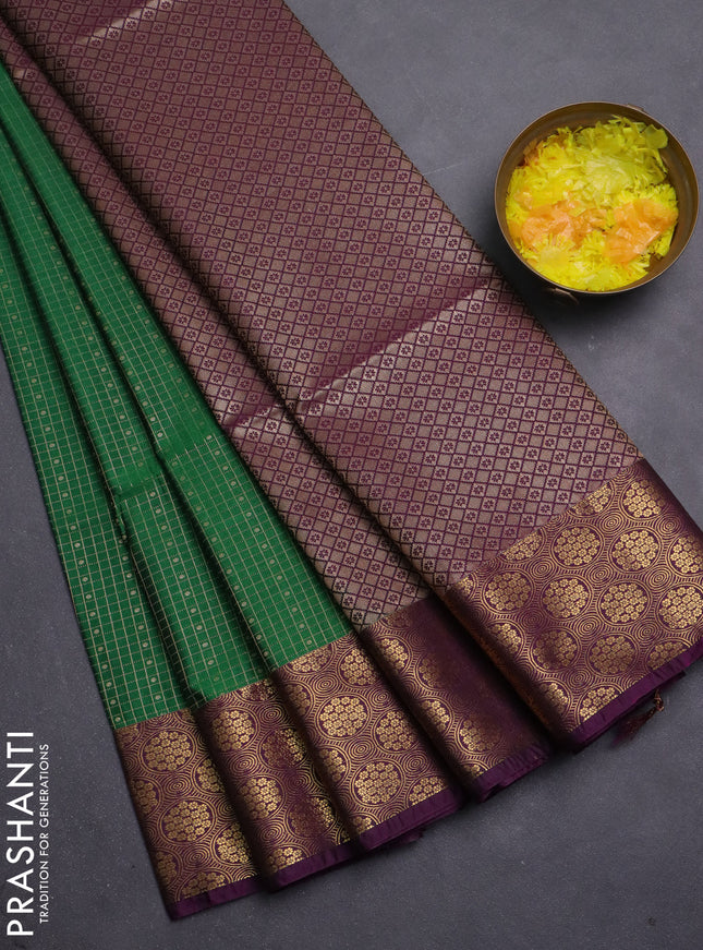 Semi soft silk saree green and purple with allover small checks & buttas and zari woven border