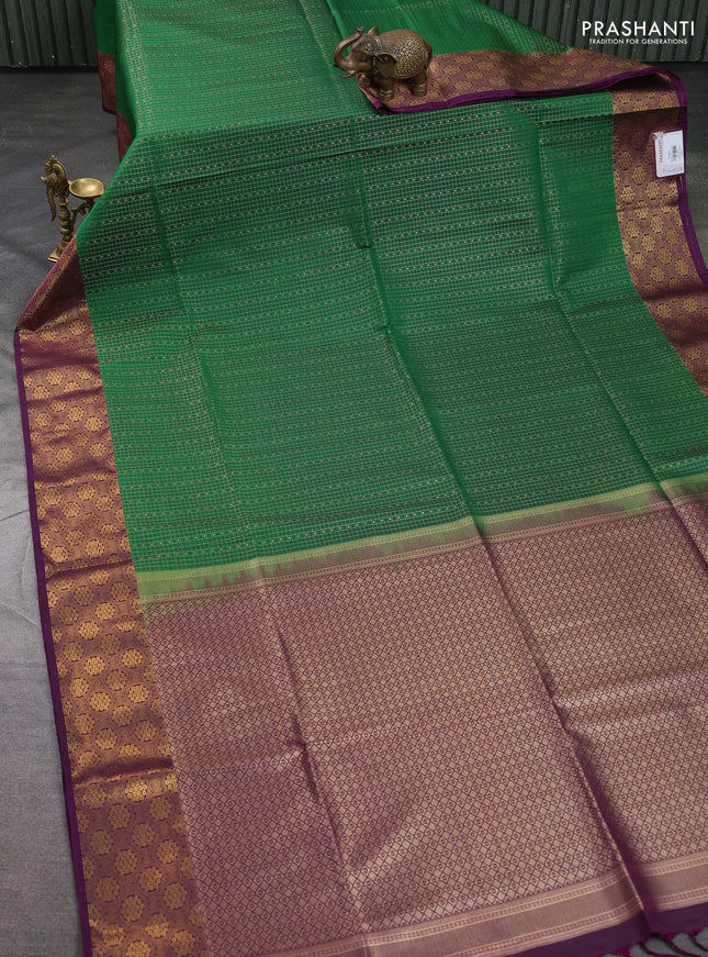 Semi soft silk saree green and purple with allover small checks & buttas and zari woven border