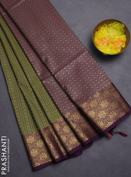Semi soft silk saree mehendi green and purple with allover small checks & buttas and zari woven border
