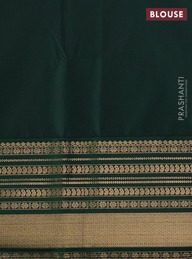 Semi soft silk saree pink and bottle green with zari woven buttas and zari woven korvai border