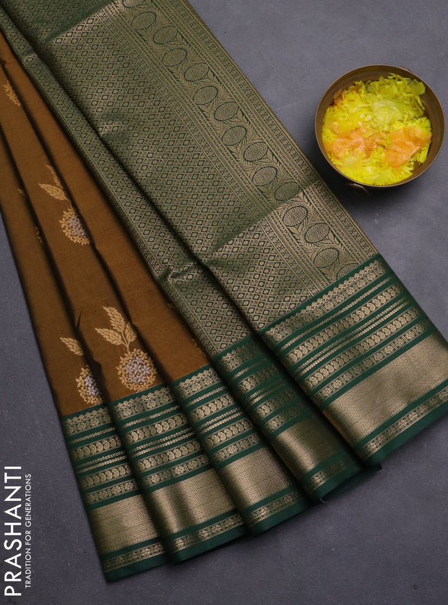 Semi soft silk saree dark mustard and bottle green with zari woven buttas and zari woven korvai border