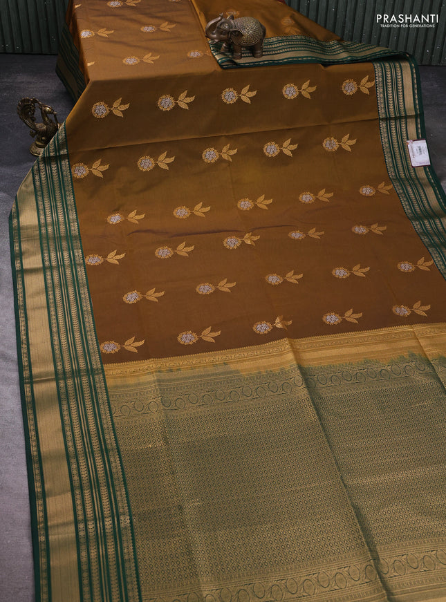 Semi soft silk saree dark mustard and bottle green with zari woven buttas and zari woven korvai border