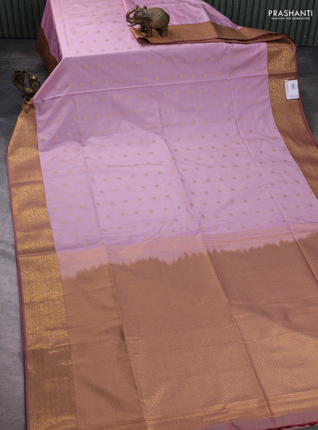 Semi soft silk saree mild lavender and pastel maroon with allover zari woven buttas and zari woven border