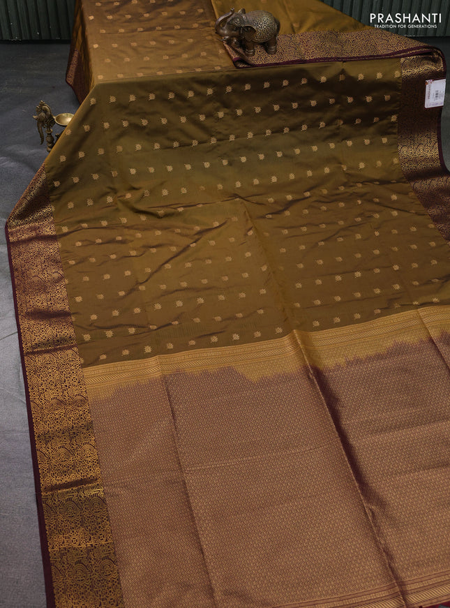 Semi soft silk saree mehendi green and deep maroon with allover zari woven buttas and zari woven border