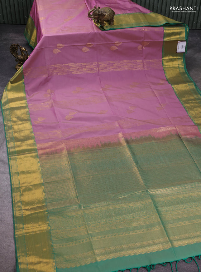 Semi soft silk saree mauve pink and green with allover zari weaves & buttas and zari woven border