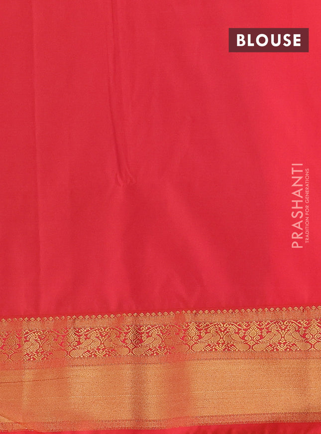 Semi soft silk saree peacock green and orange with allover zari woven buttas and zari woven border