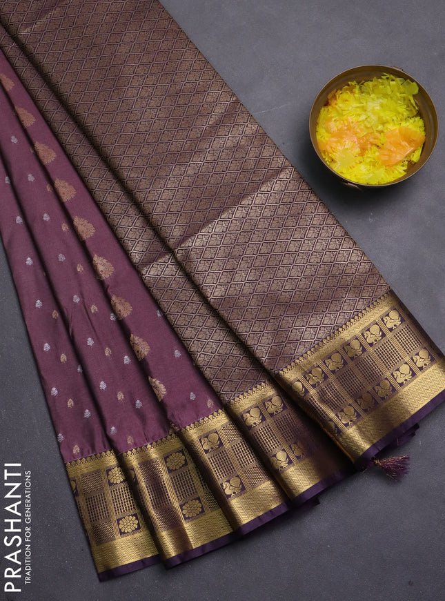 Semi soft silk saree rosy brown and purple with allover zari woven buttas and zari woven border