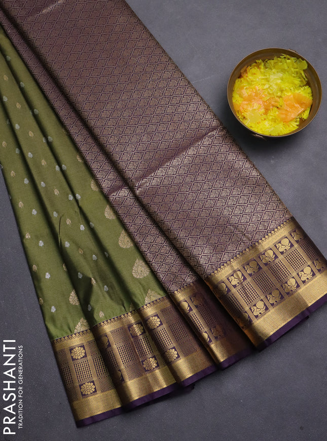 Semi soft silk saree mehendi green and deep purple with allover zari woven buttas and zari woven border