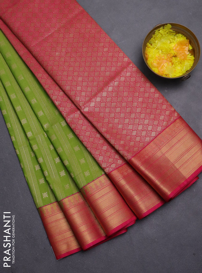 Semi soft silk saree light green and pink with allover zari weaves & buttas and zari woven border