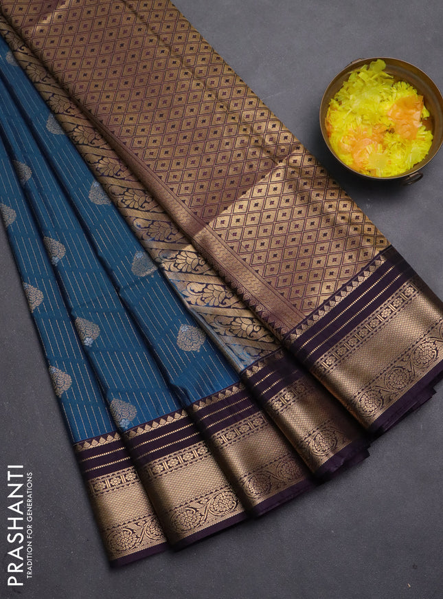 Semi soft silk saree teal green and violet with allover zari weaves & buttas and zari woven border