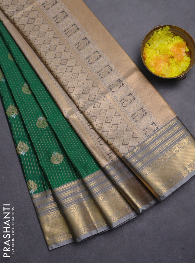 Semi soft silk saree green and grey with allover zari weaves & buttas and zari woven border