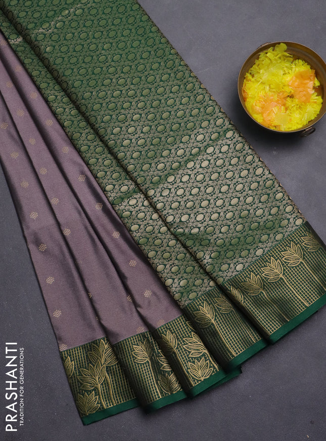 Semi soft silk saree rosy brown and green with allover zari woven buttas and zari woven border