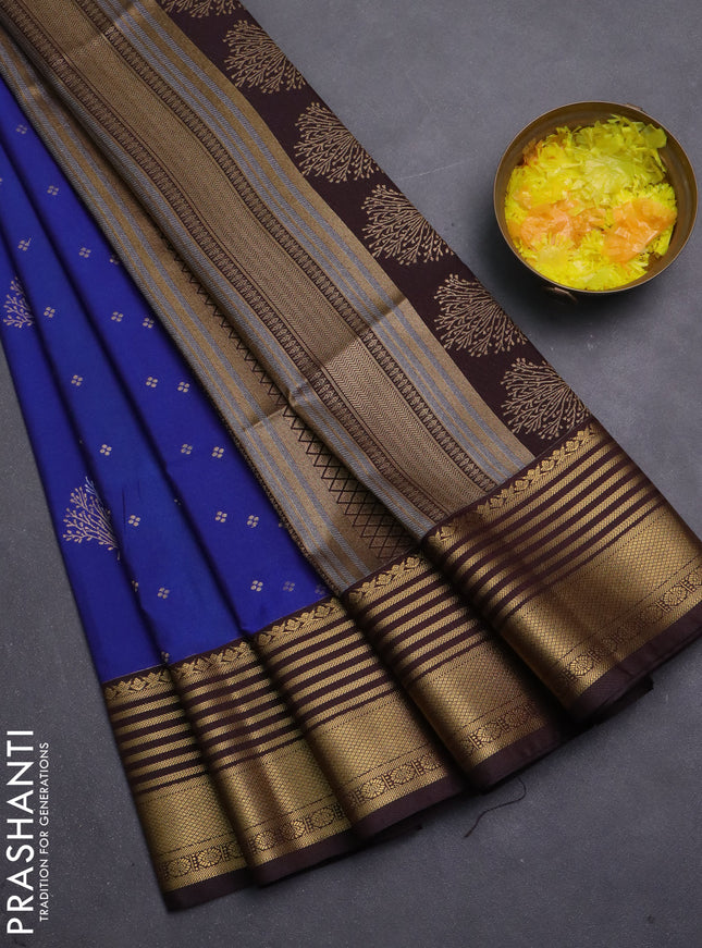Semi soft silk saree blue and coffee brown with allover zari woven buttas and zari woven korvai border