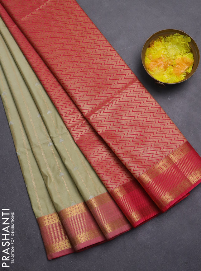 Semi soft silk saree pista green and pink with allover zari weaves & buttas and zari woven butta korvai border