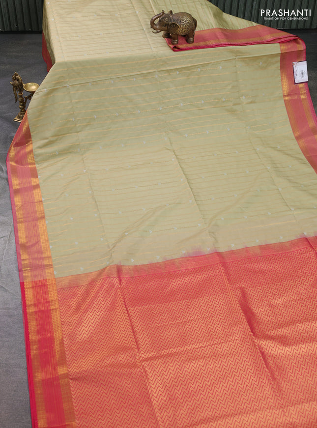 Semi soft silk saree pista green and pink with allover zari weaves & buttas and zari woven butta korvai border