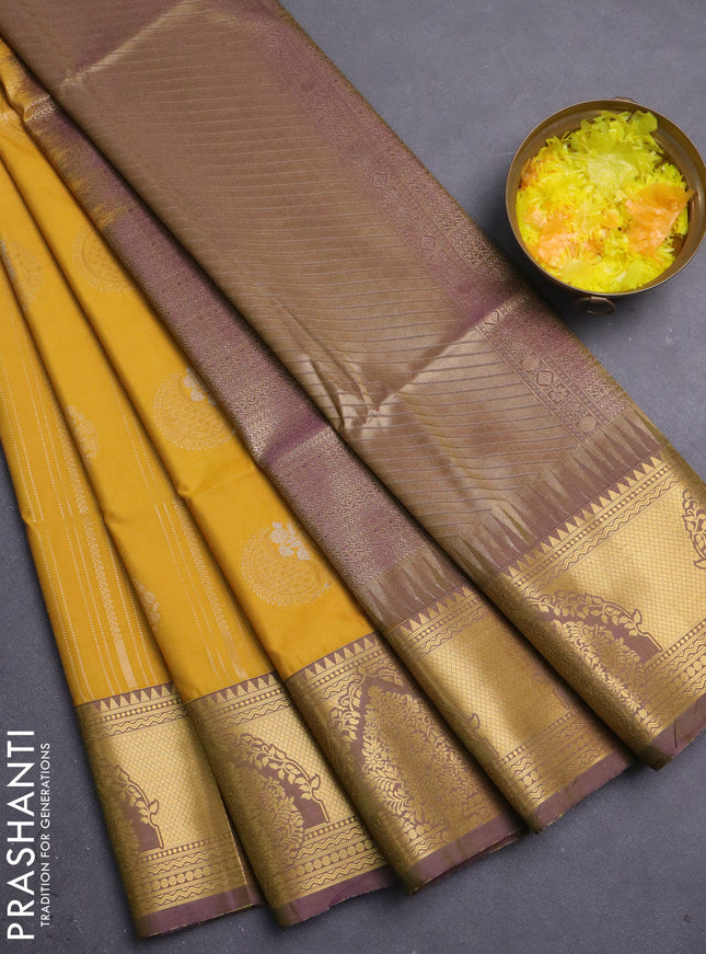 Semi soft silk saree mustard yellow and violet with allover zari weaves & buttas and zari woven butta korvai border