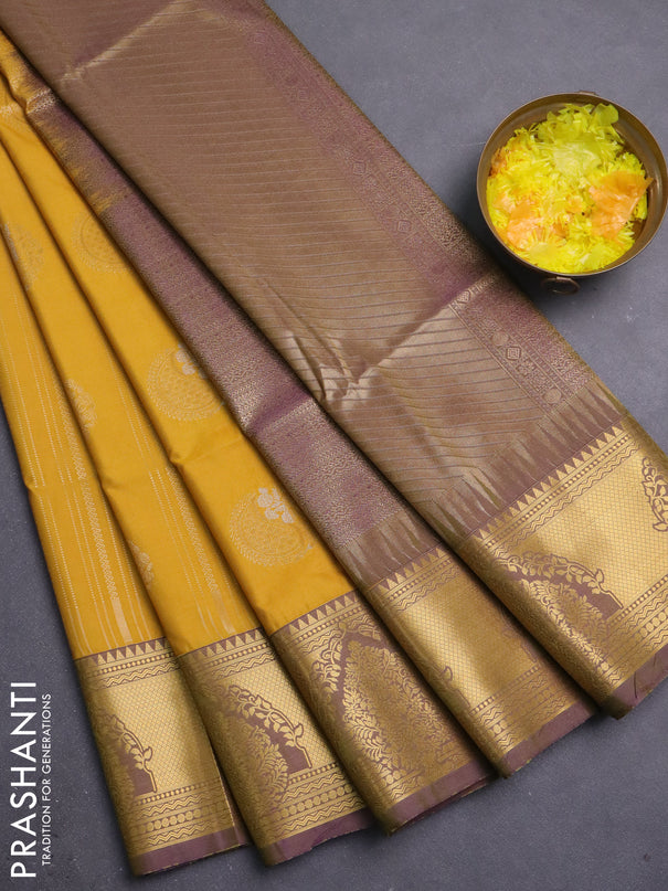 Semi soft silk saree mustard yellow and violet with allover zari weaves & buttas and zari woven butta korvai border