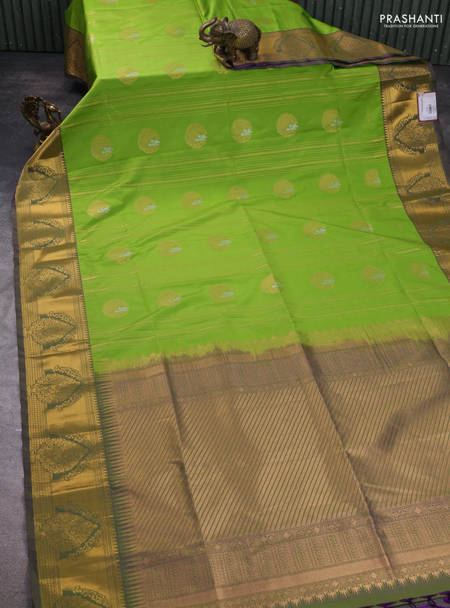 Semi soft silk saree parrot green and dual shade of greenish purple with allover zari weaves & buttas and zari woven butta korvai border