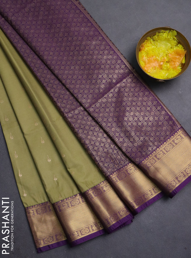 Semi soft silk saree elaichi green and purple with allover zari woven buttas and zari woven border