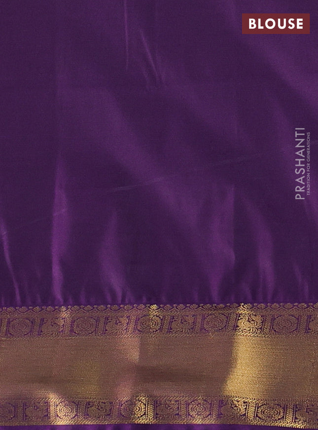 Semi soft silk saree elaichi green and purple with allover zari woven buttas and zari woven border
