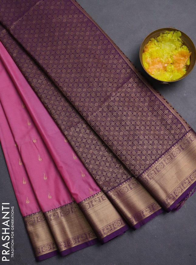 Semi soft silk saree peach pink and purple with allover zari woven buttas and zari woven border