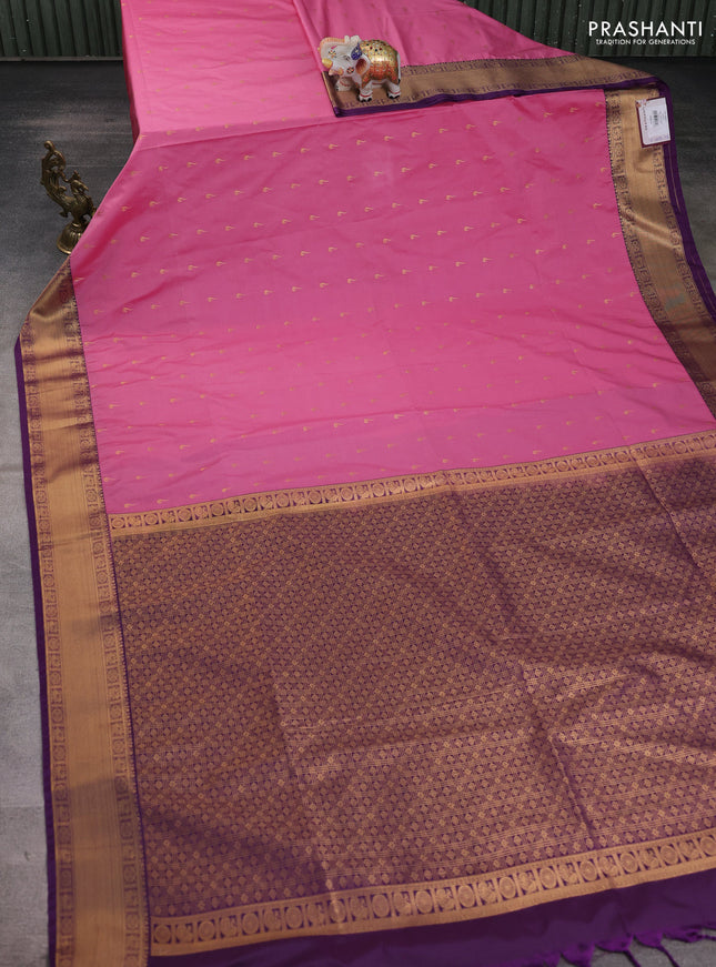 Semi soft silk saree peach pink and purple with allover zari woven buttas and zari woven border