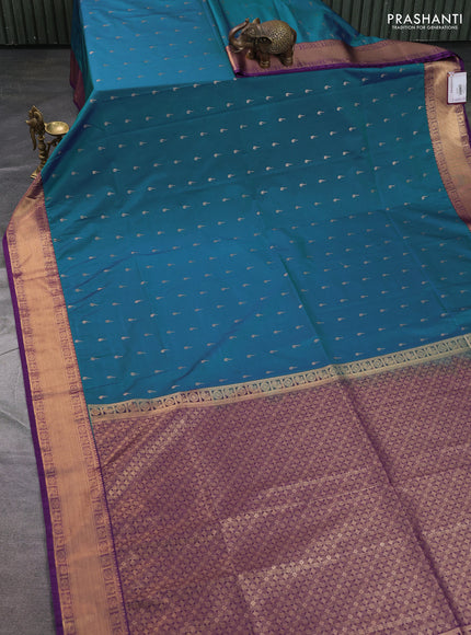 Semi soft silk saree blue and purple with allover zari woven buttas and zari woven border