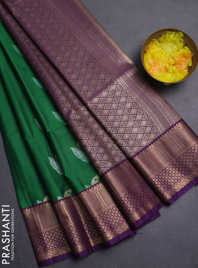 Semi soft silk saree green and purple with zari woven buttas and zari woven border