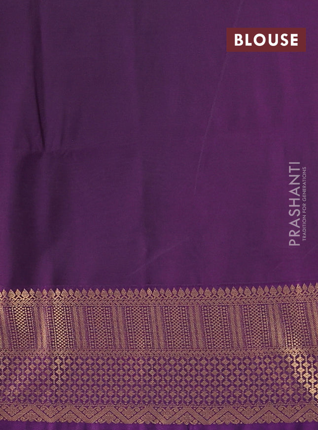 Semi soft silk saree green and purple with zari woven buttas and zari woven border