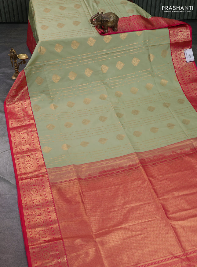 Semi soft silk saree pista green and pink with allover zari weaves & buttas and zari woven border