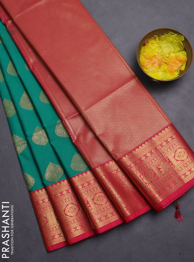 Semi soft silk saree green and pink with allover zari weaves & buttas and zari woven border