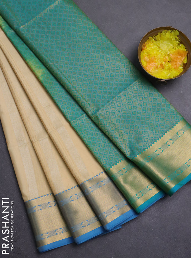 Semi soft silk saree cream and cs blue with zari weaves & buttas and zari woven border