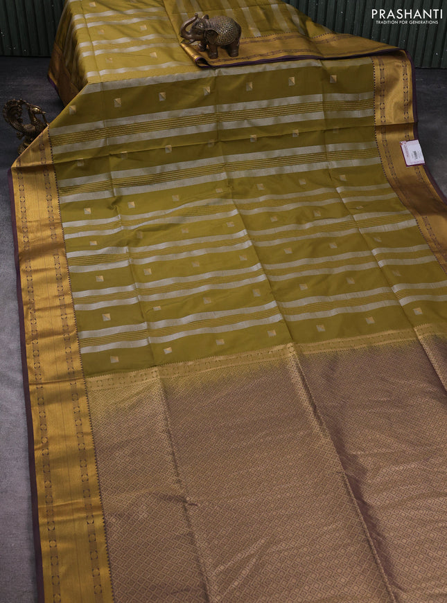 Semi soft silk saree mehendi green and dual shade of greenish purple with zari weaves & buttas and zari woven border