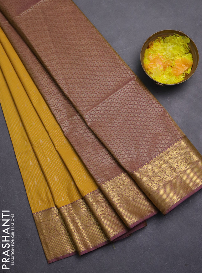 Semi soft silk saree mustard yellow and dual shade of purple with allover zari weaves & buttas and zari woven border