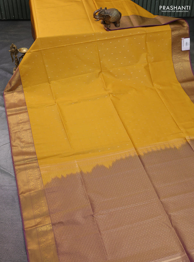 Semi soft silk saree mustard yellow and dual shade of purple with allover zari weaves & buttas and zari woven border
