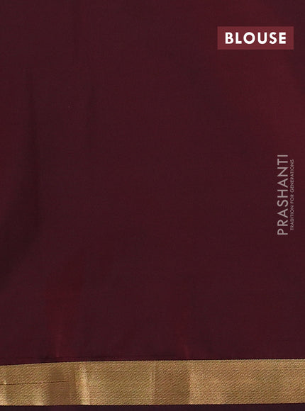 Semi soft silk saree blue and maroon with allover zari weaves & buttas and small zari woven border