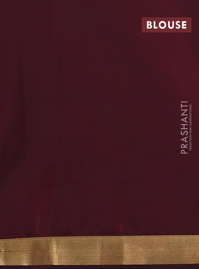 Semi soft silk saree blue and maroon with allover zari weaves & buttas and small zari woven border